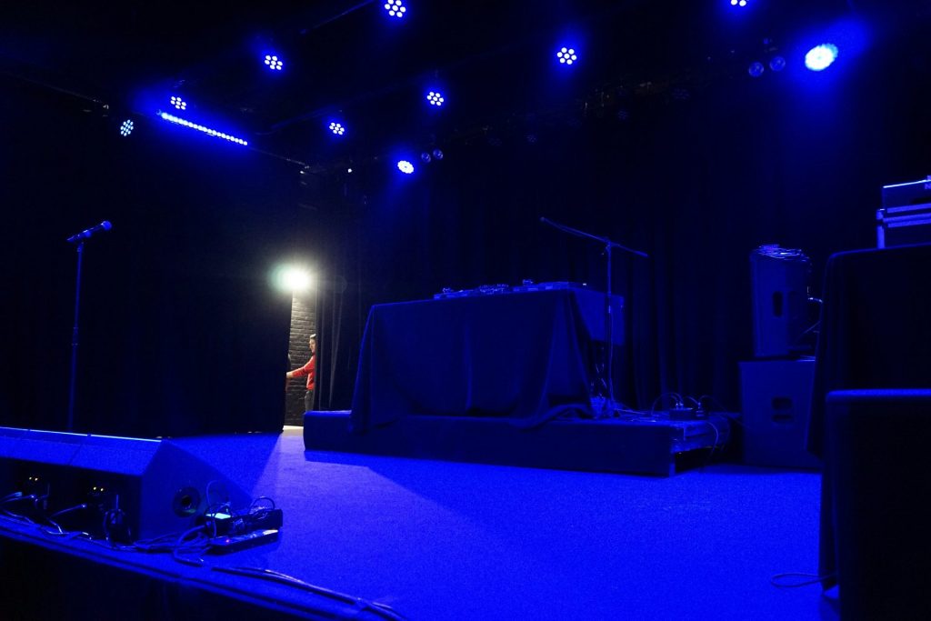 Empty concert stage with blue lighting