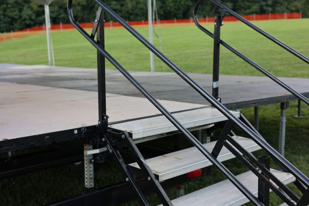 a set of stairs leading to a baseball field